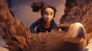 A girl rides a large eagle through the sky in a scene from Wildwood.